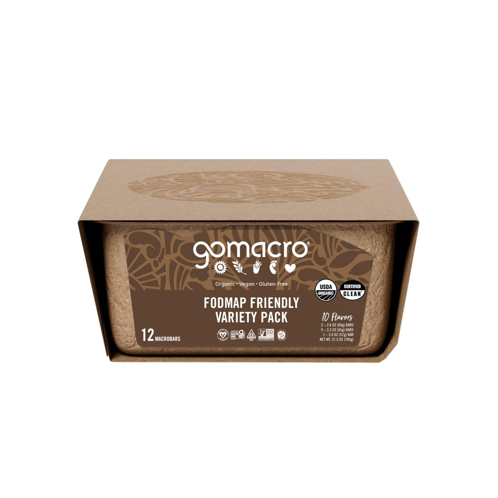GoMacro bar held in hand to show real size and portable convenience for on-the-go fueling