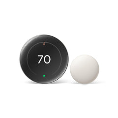 Google Nest thermostat front view showing sleek silver design and easy readability