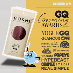 GOSHI towel in shower lathering with soap for effective cleansing and foam