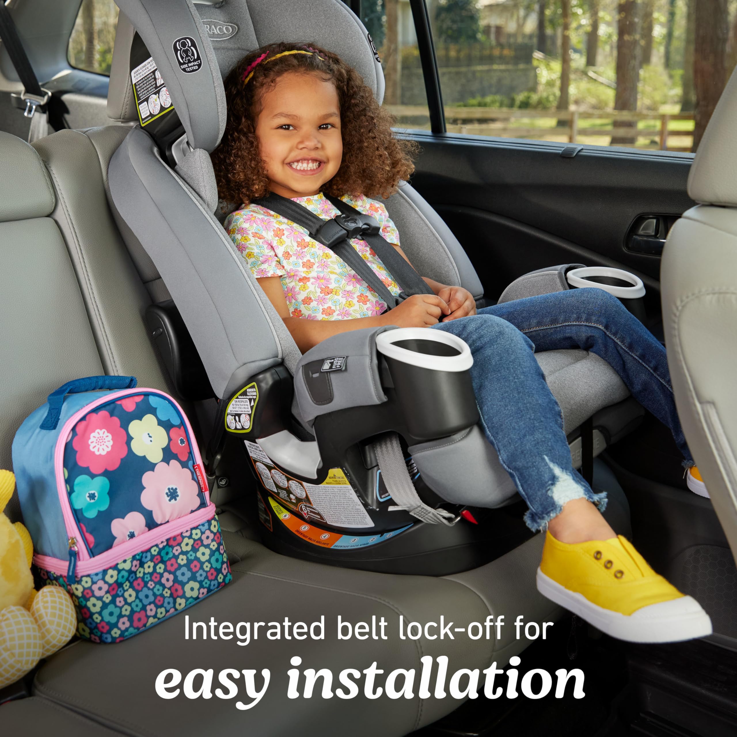 Graco 4Ever DLX headrest and harness adjustment showing easy one-motion change