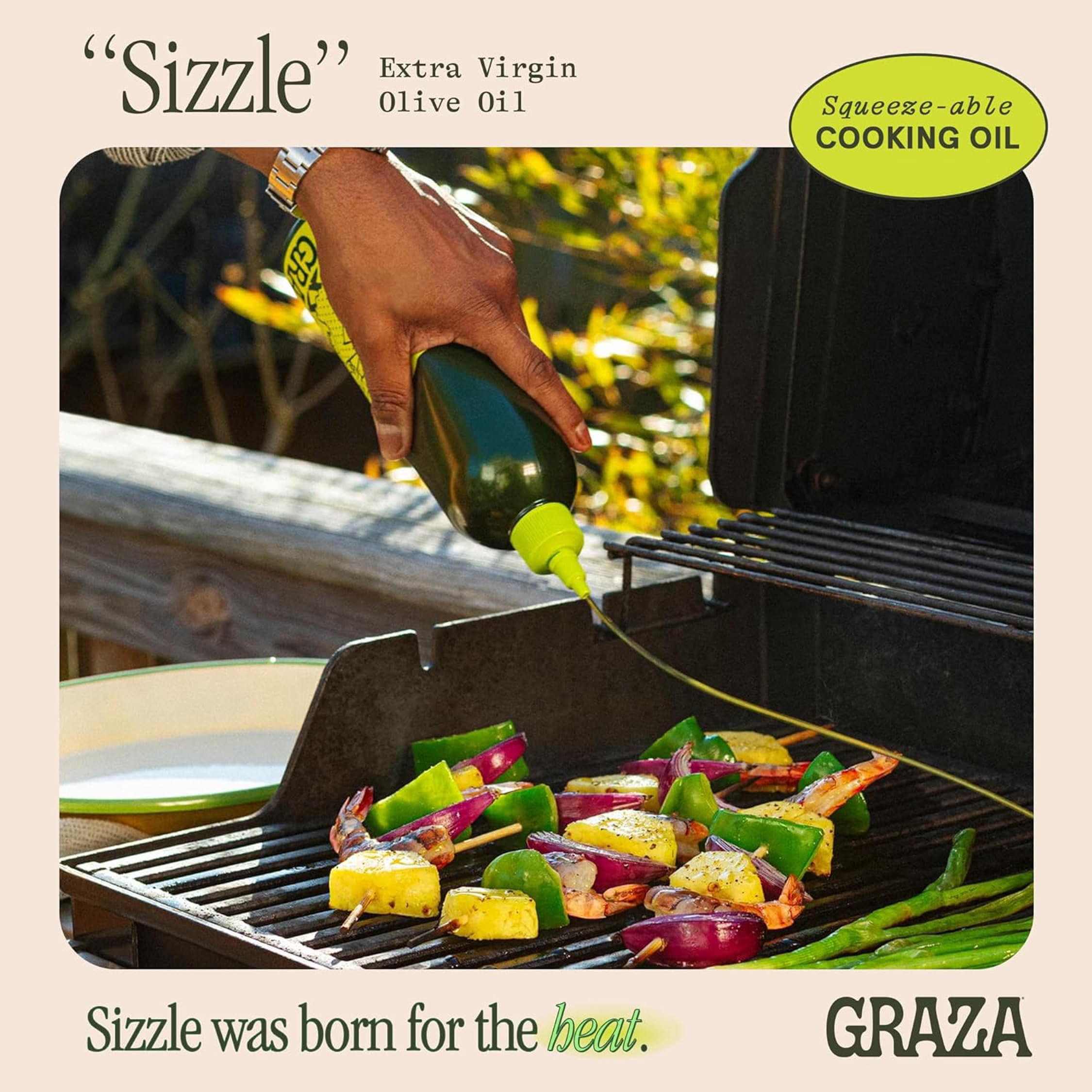 Graza Sizzle being poured into a hot pan for searing, demonstrating heat use