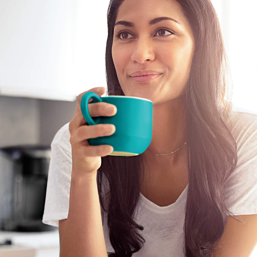 Green Mountain Coffee Roasters lifestyle kitchen scene with mug for cozy morning moments