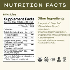 Greenhouse Juice Co. close-up of vibrant ginger turmeric texture, highlights cold-pressed freshness