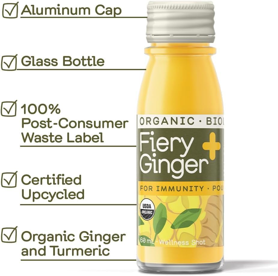 Greenhouse Juice Co. bottle on kitchen counter with citrus and herbs, lifestyle convenience and flavor
