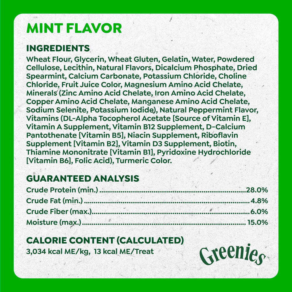 Dog eating Greenies treat showing enjoyment and fast reward