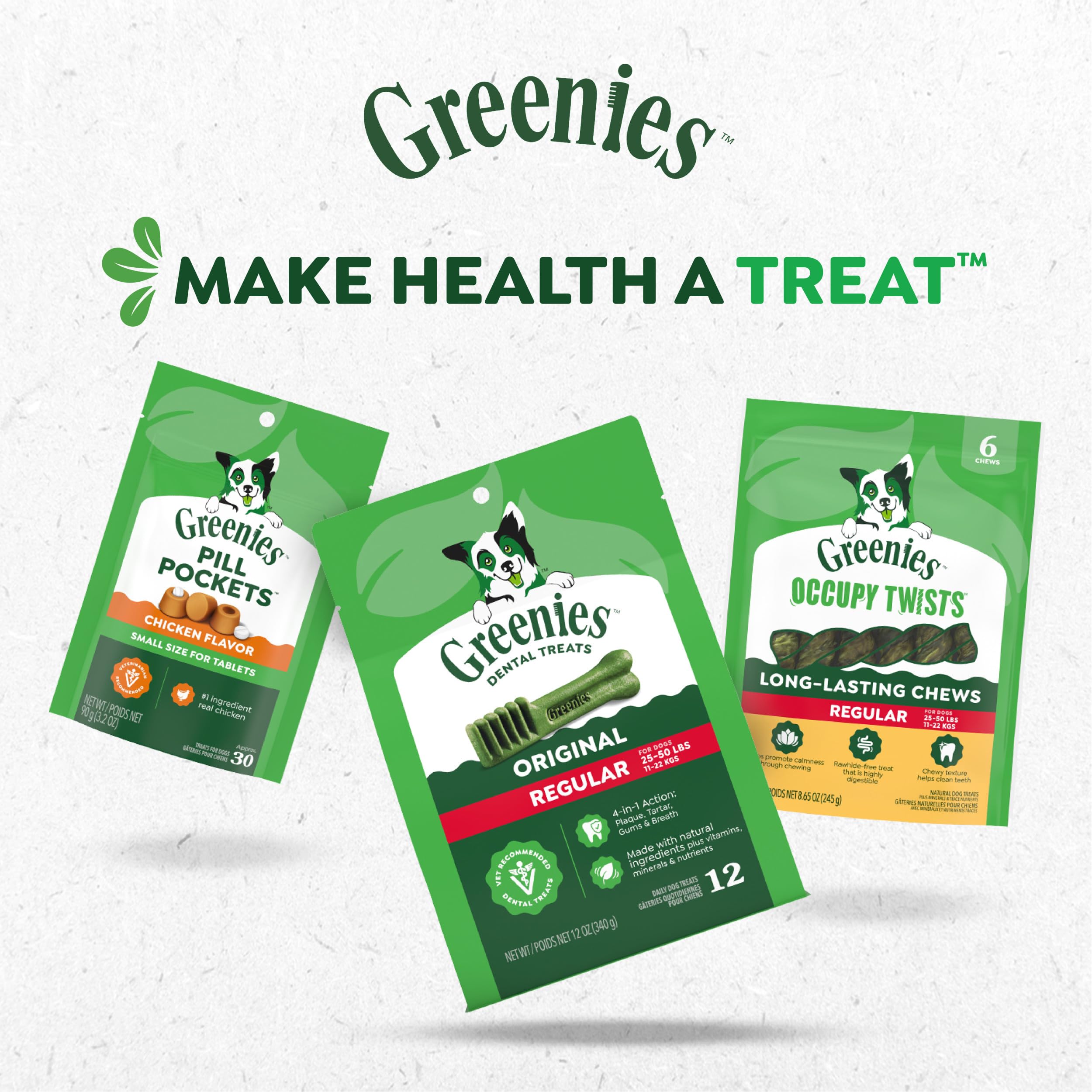 Trainer giving Greenies in park to motivate and reward behavior