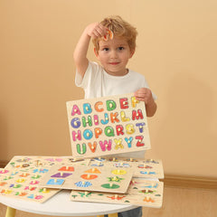 GRINNNIE close-up of alphabet puzzle pieces showing clear letters for learning benefit
