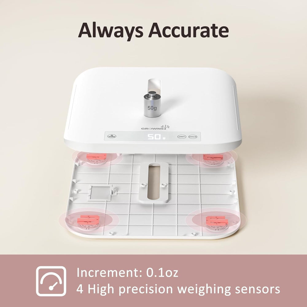 GROWNSY infant being weighed on scale showcasing motion-hold feature for steadier results