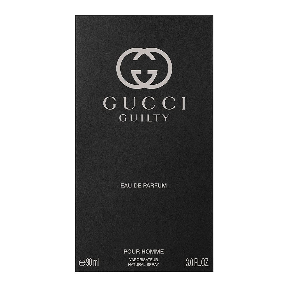 Hand spraying Gucci Guilty demonstrating easy application and scent release