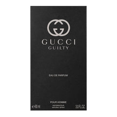 Hand spraying Gucci Guilty demonstrating easy application and scent release