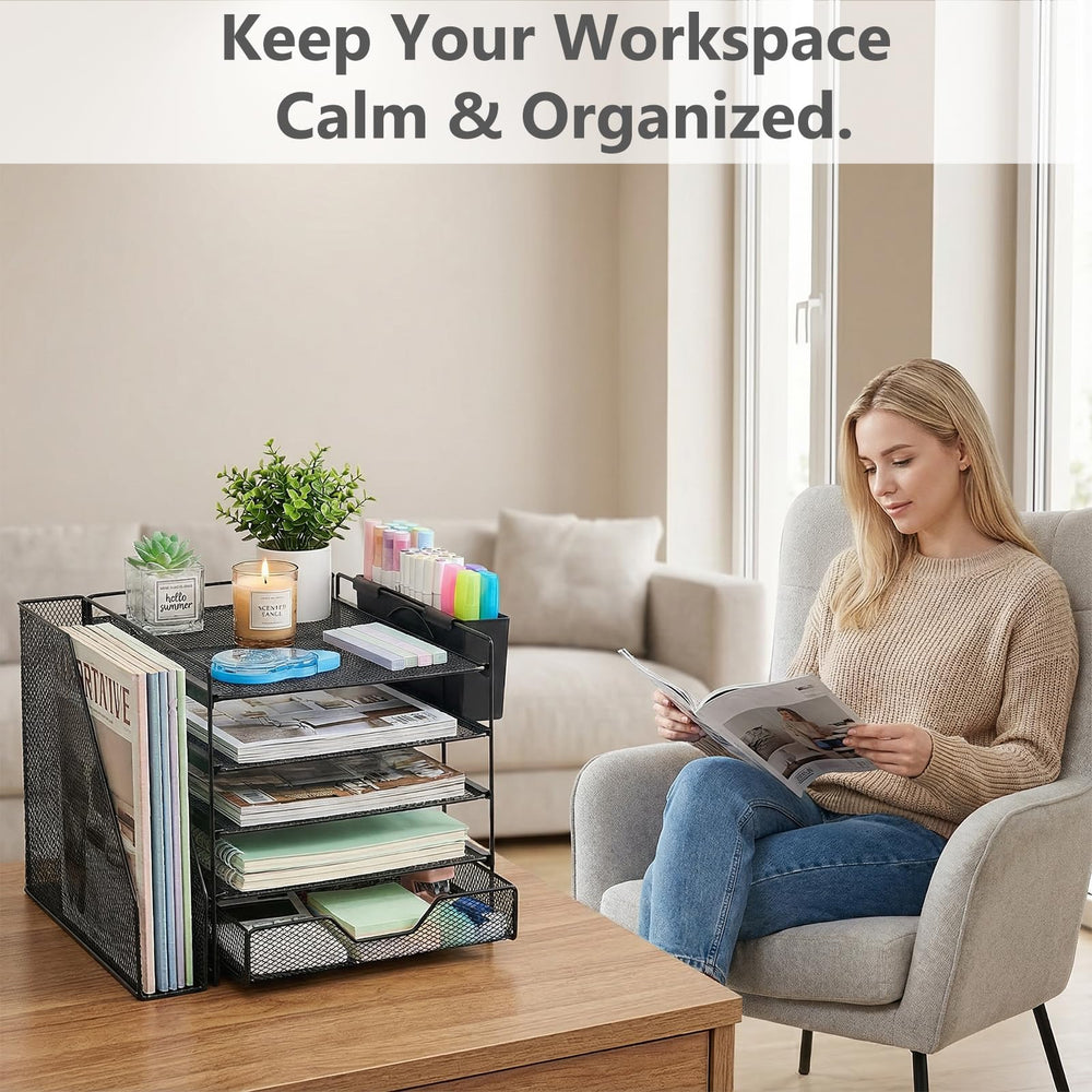 Gugsey next to laptop for size comparison showing compact, space-saving footprint