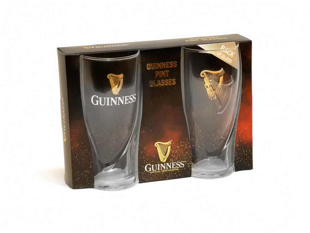 Guinness glass next to bottle for scale showing true 20oz capacity benefit