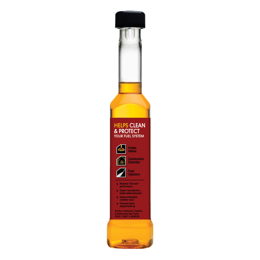 Gumout bottle close-up label showing instructions and mileage focus