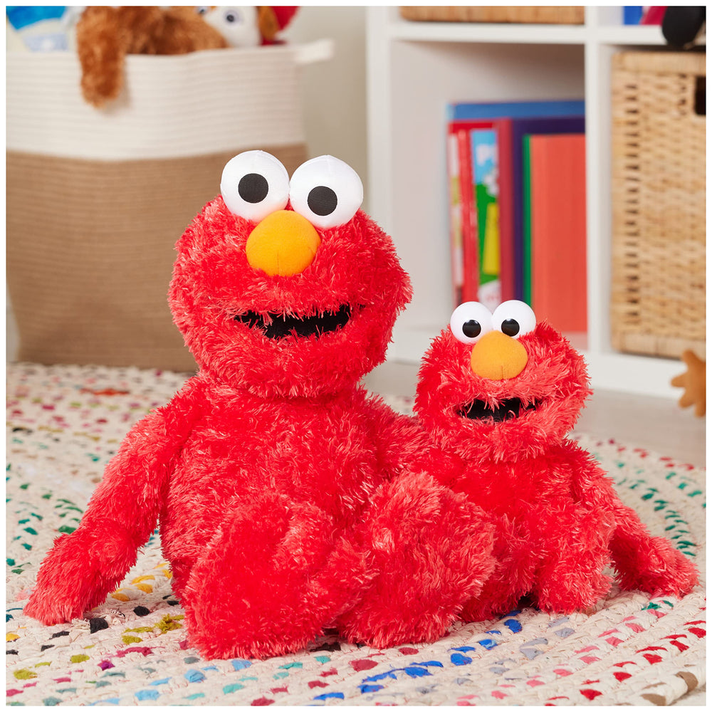 GUND Elmo styled on bed to show room-decor charm