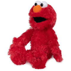 GUND Elmo full body next to couch showing ideal hug size