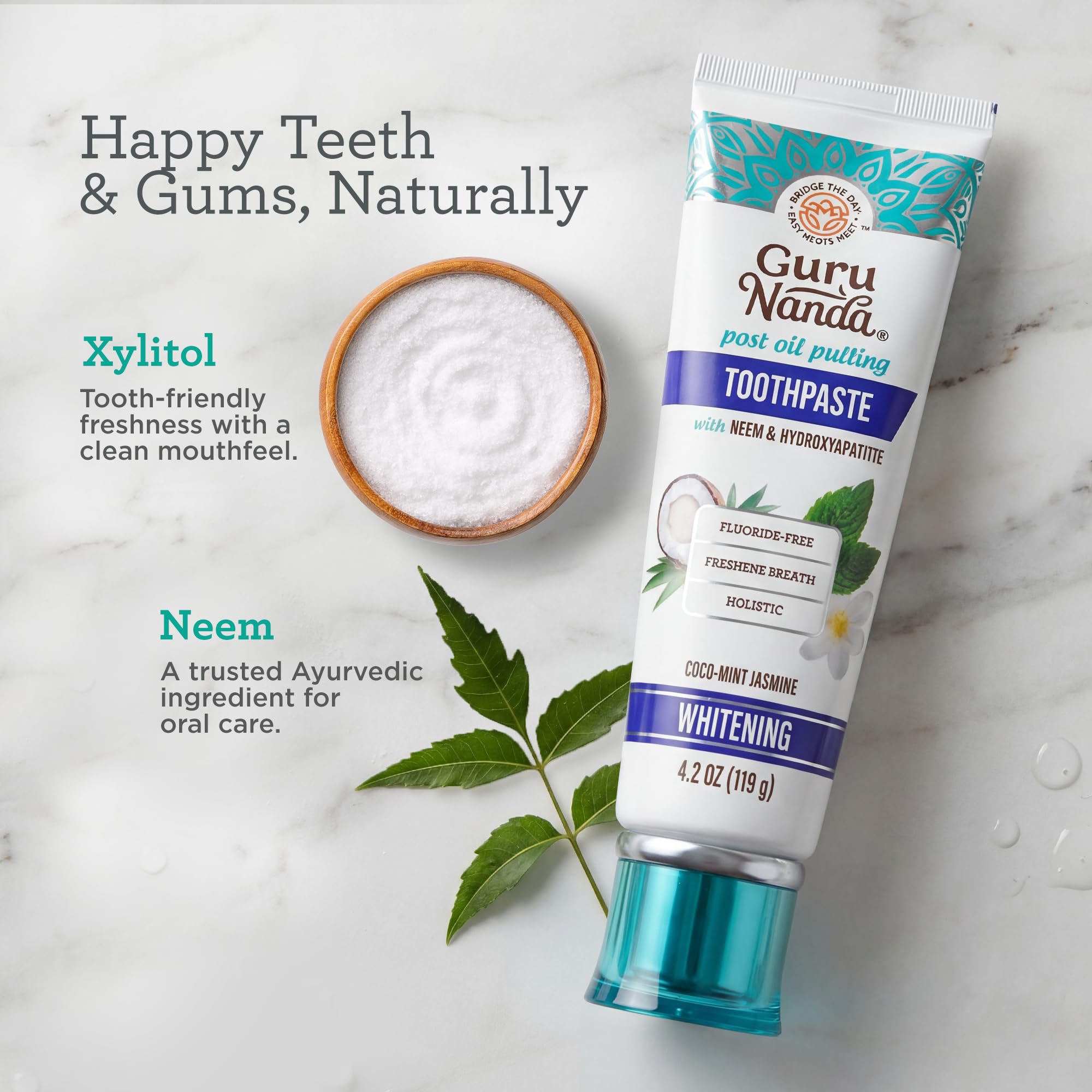 GuruNanda toothpaste squeezer in use, demonstrates waste reduction and longer tube life