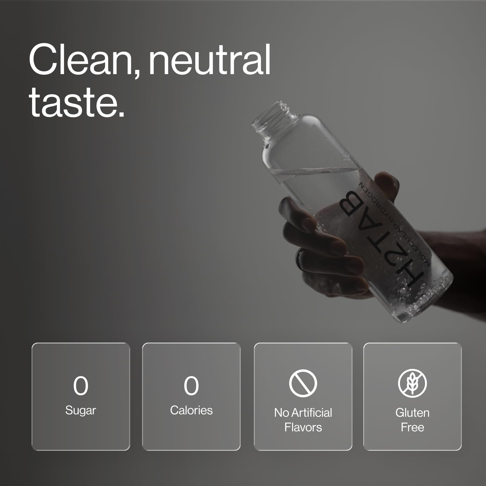 H2TAB tablet effervescing in a clear glass demonstrating fast hydrogen release