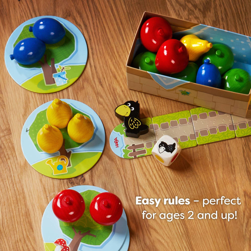 HABA First Orchard board layout with fruit spaces and raven track for clear play