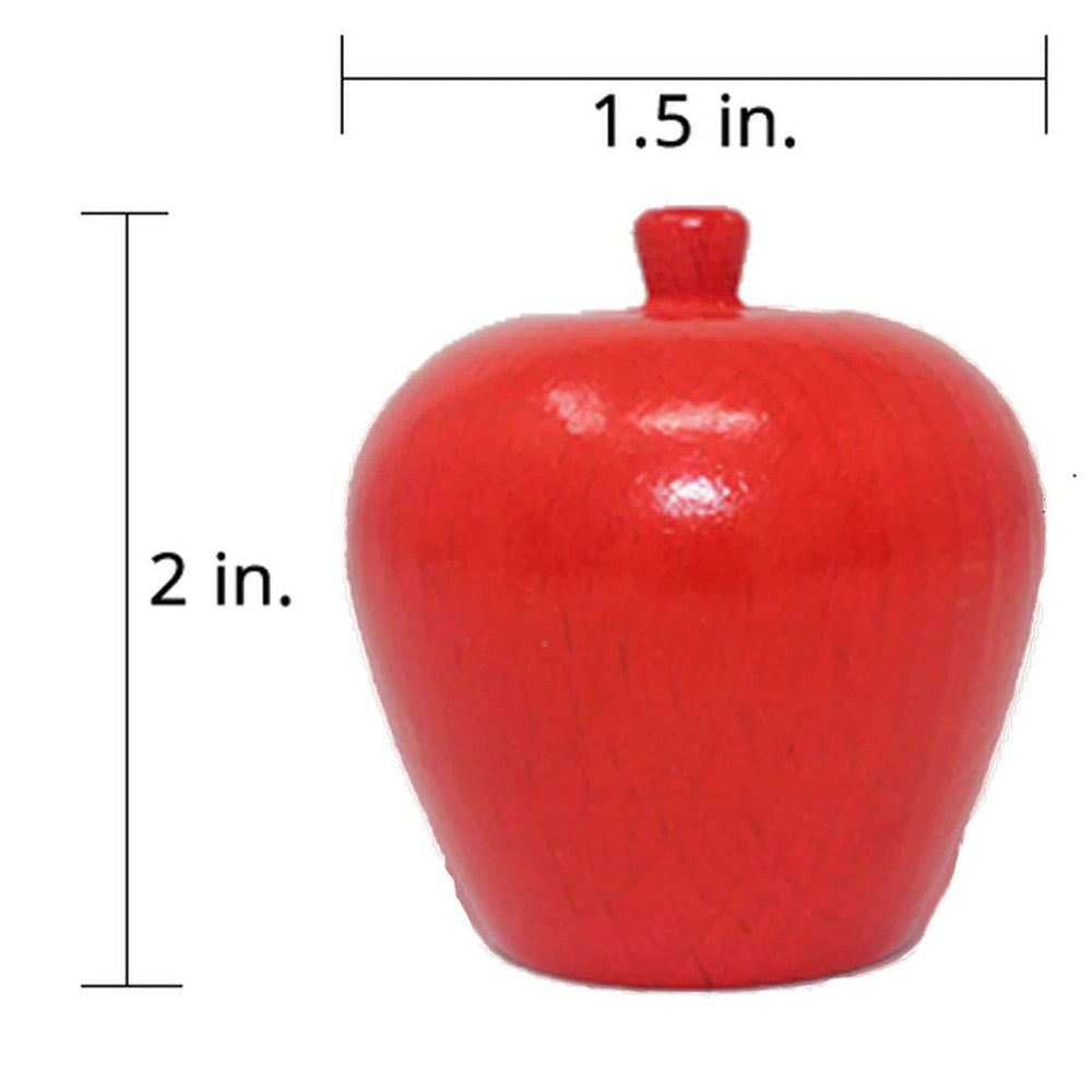 HABA First Orchard package in adult hand showing compact size for travel