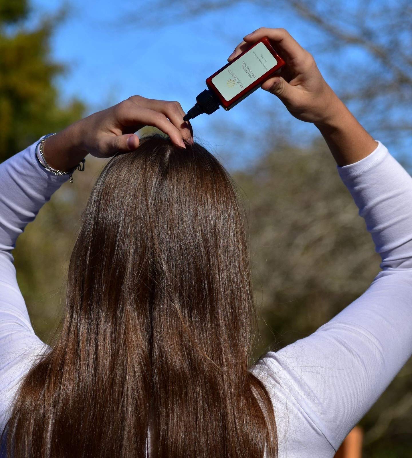 Hair Dance tucked inside a travel bag ready for on-the-go touch-ups