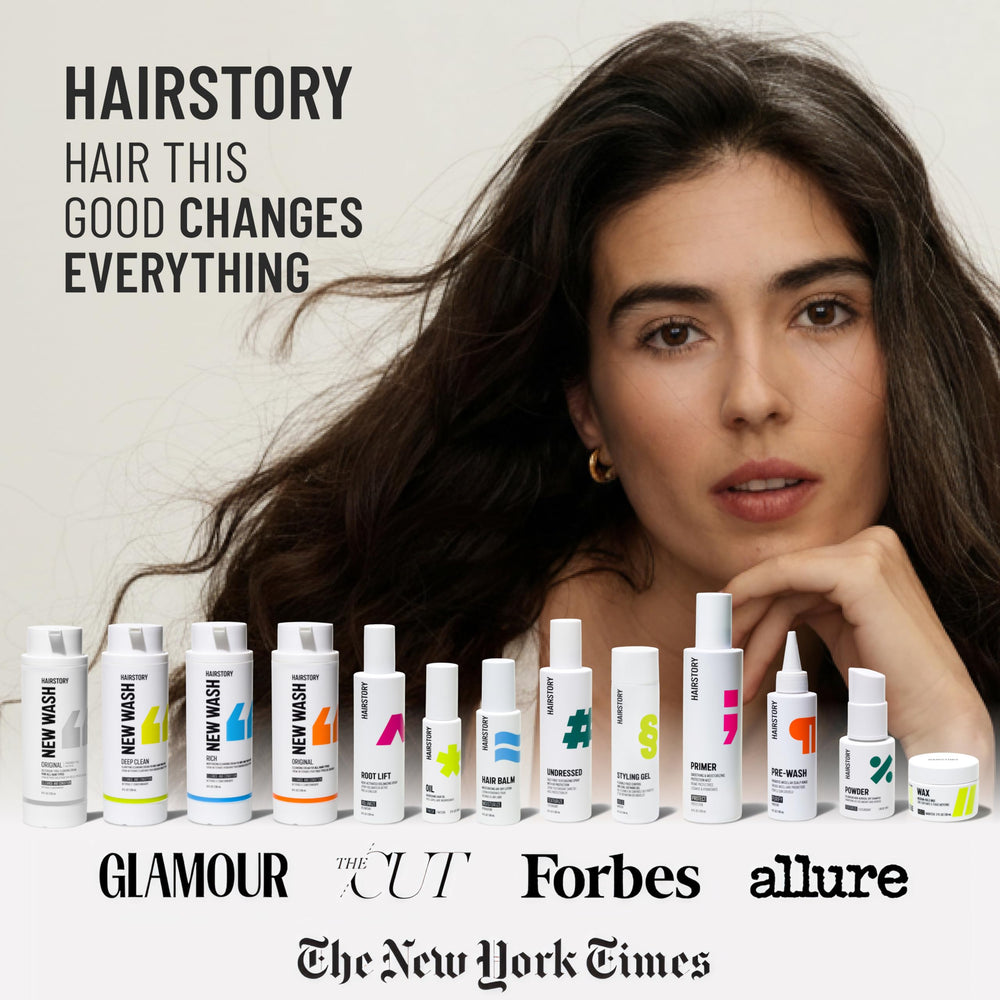 Hairstory New Wash flatlay with jojoba and sunflower visuals emphasizing natural, color-safe formula