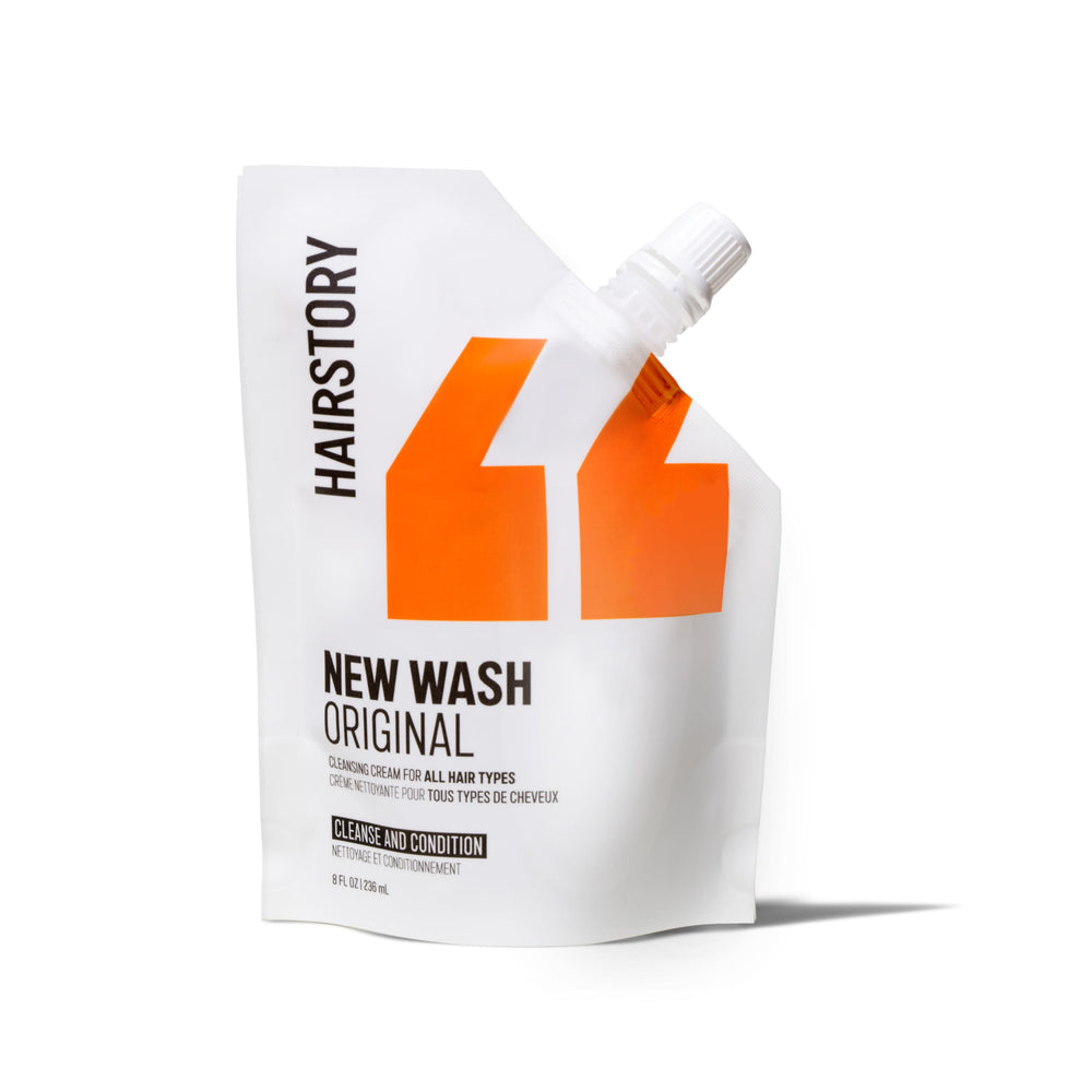 Hairstory New Wash front packaging showing refill container and simple labeling benefit: easy refill