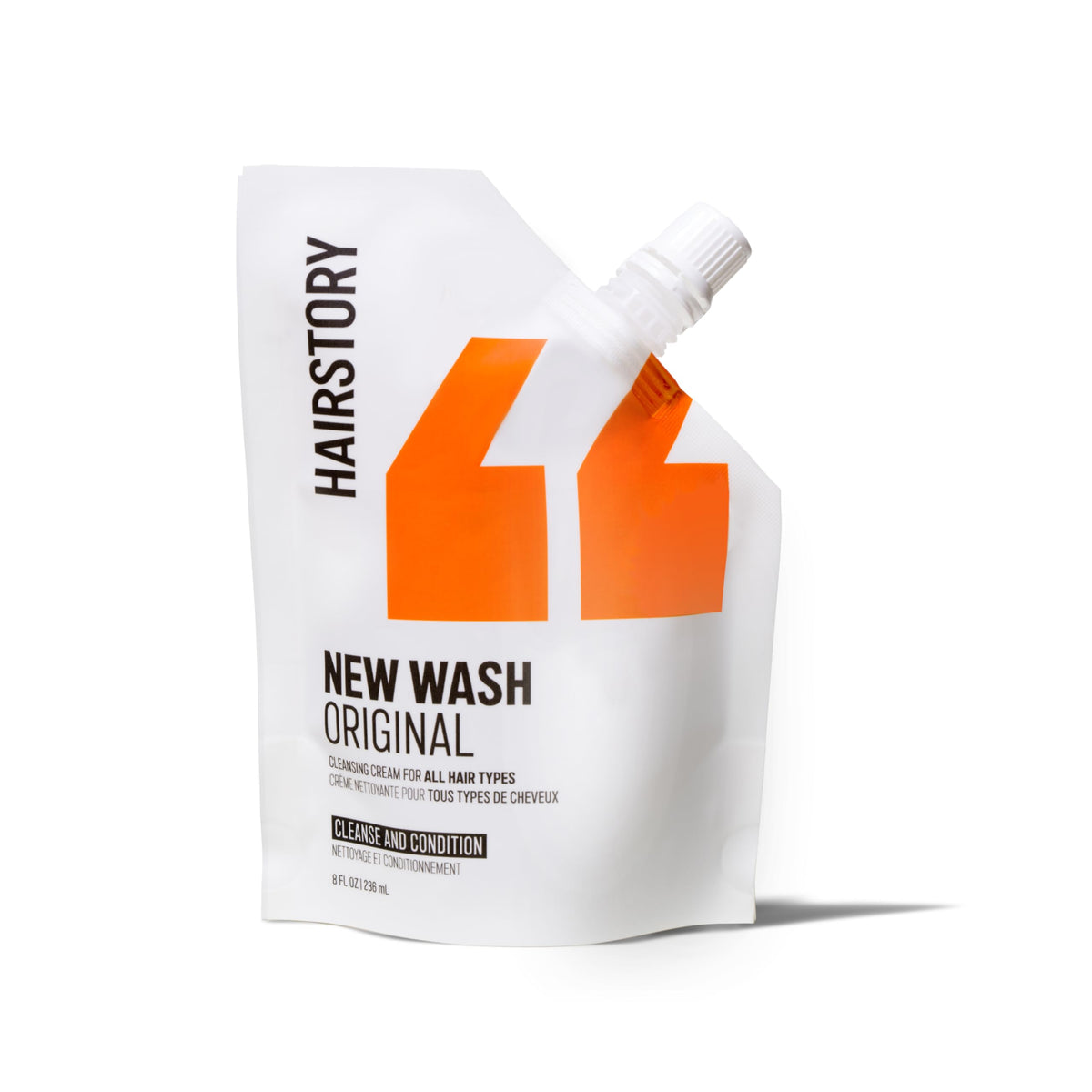 Hairstory New Wash front packaging showing refill container and simple labeling benefit: easy refill
