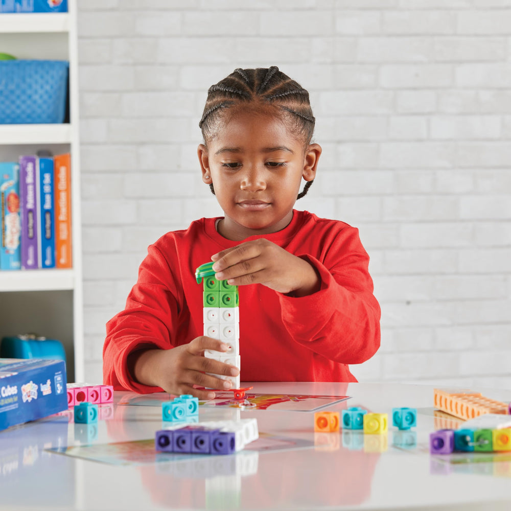hand2mind Numberblocks accessories laid out including hat, skateboard, and Numberlings