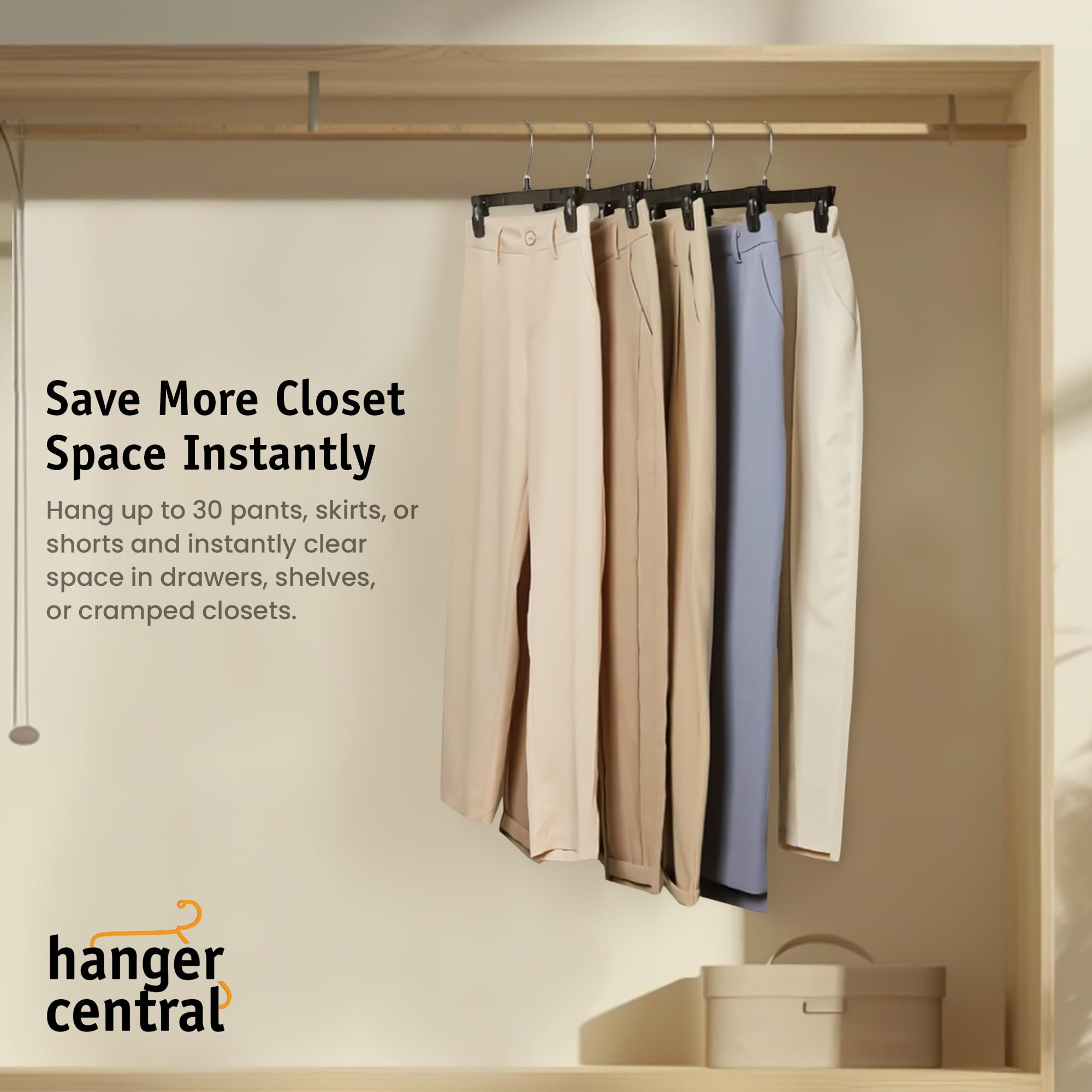 Hanger Central hangers neatly organized on a closet rod to maximize space