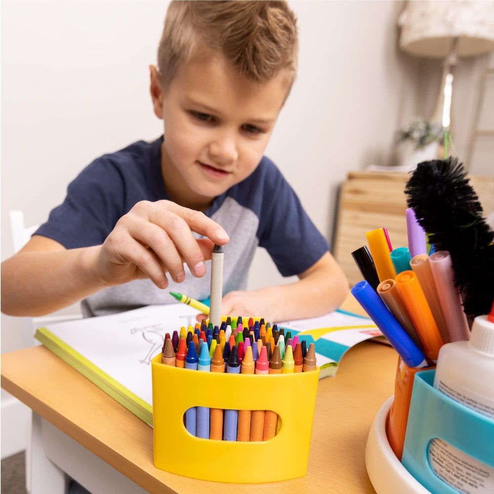 Hapinest caddy on classroom table with children crafting showing improved classroom workflow