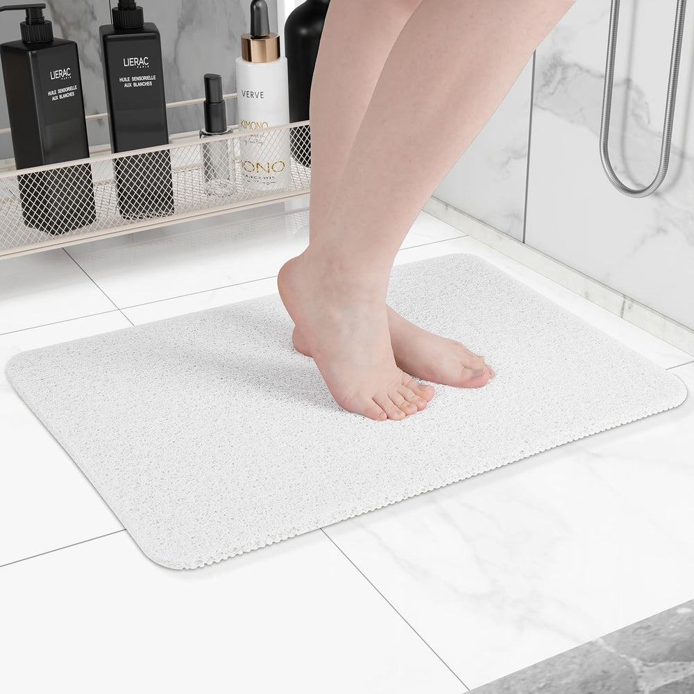 Hargiis front view of white bathtub mat showing size and clean design benefit