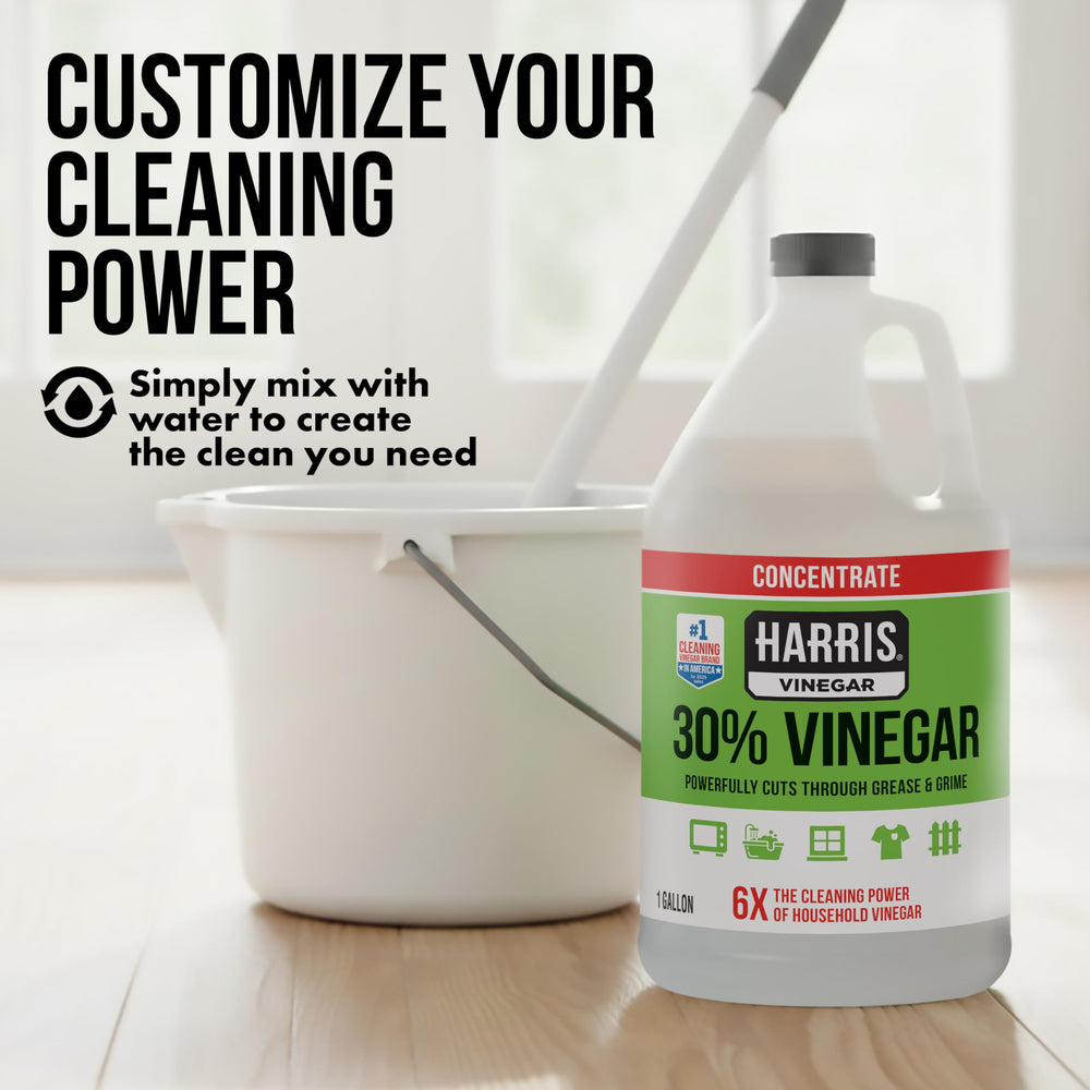 HARRIS cleaning patio with pressure rinse revealing restored outdoor surface