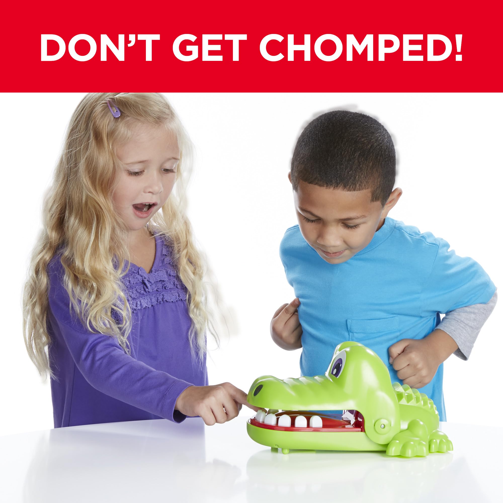 Hasbro game components laid out to show included teeth and labels