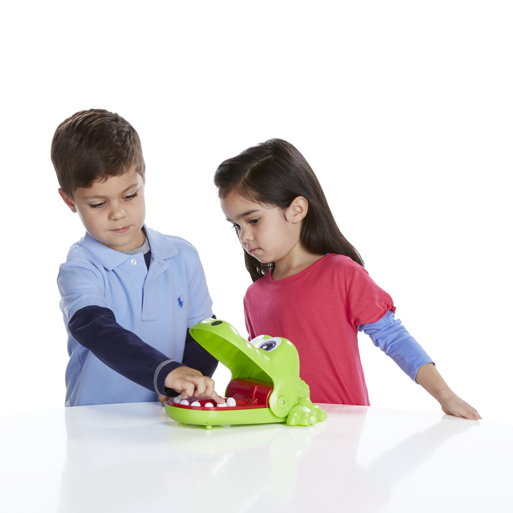 Hasbro kids playing Crocodile Dentist together in living room for family fun
