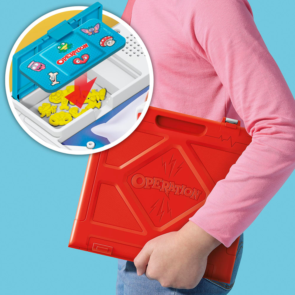 Hasbro Operation tweezers close-up demonstrating precise tool and improved hand-eye control