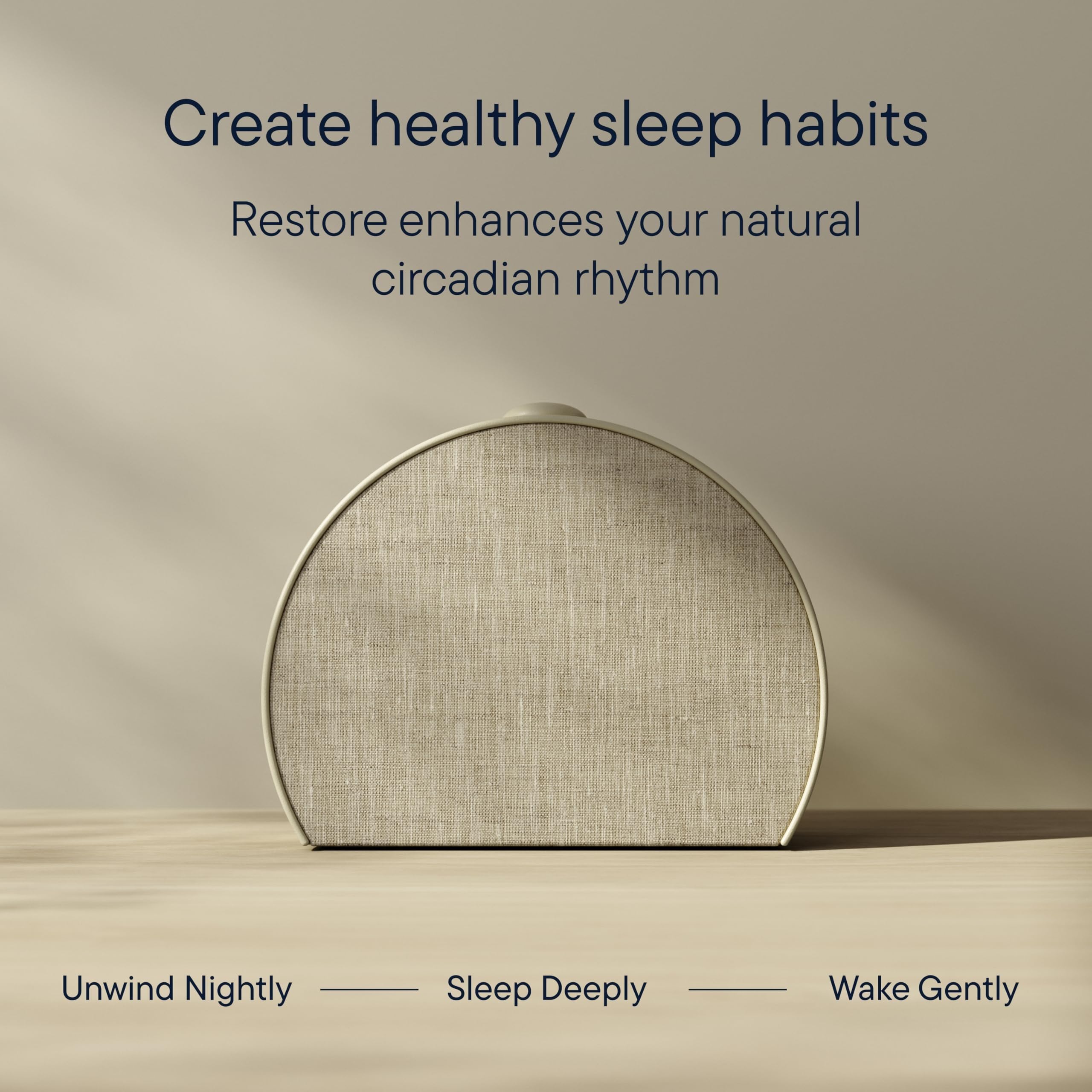 Hatch Restore 3 on a bedside table demonstrating soothing sleep setup