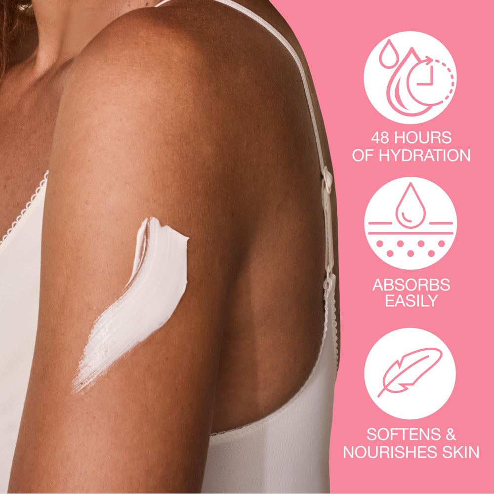 Hempz hands applying lotion to arm to show smooth, non-greasy finish