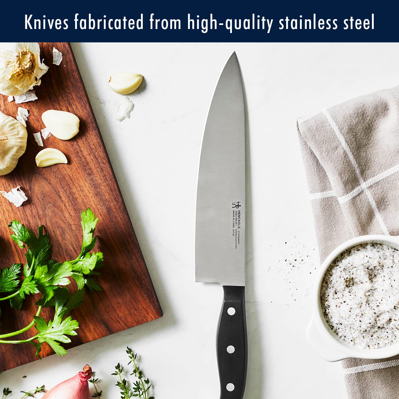 HENCKELS six steak knives arranged to show uniform edges and dinner-ready benefit