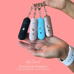 HerTime2 attached to a purse strap demonstrating quick accessibility on bags