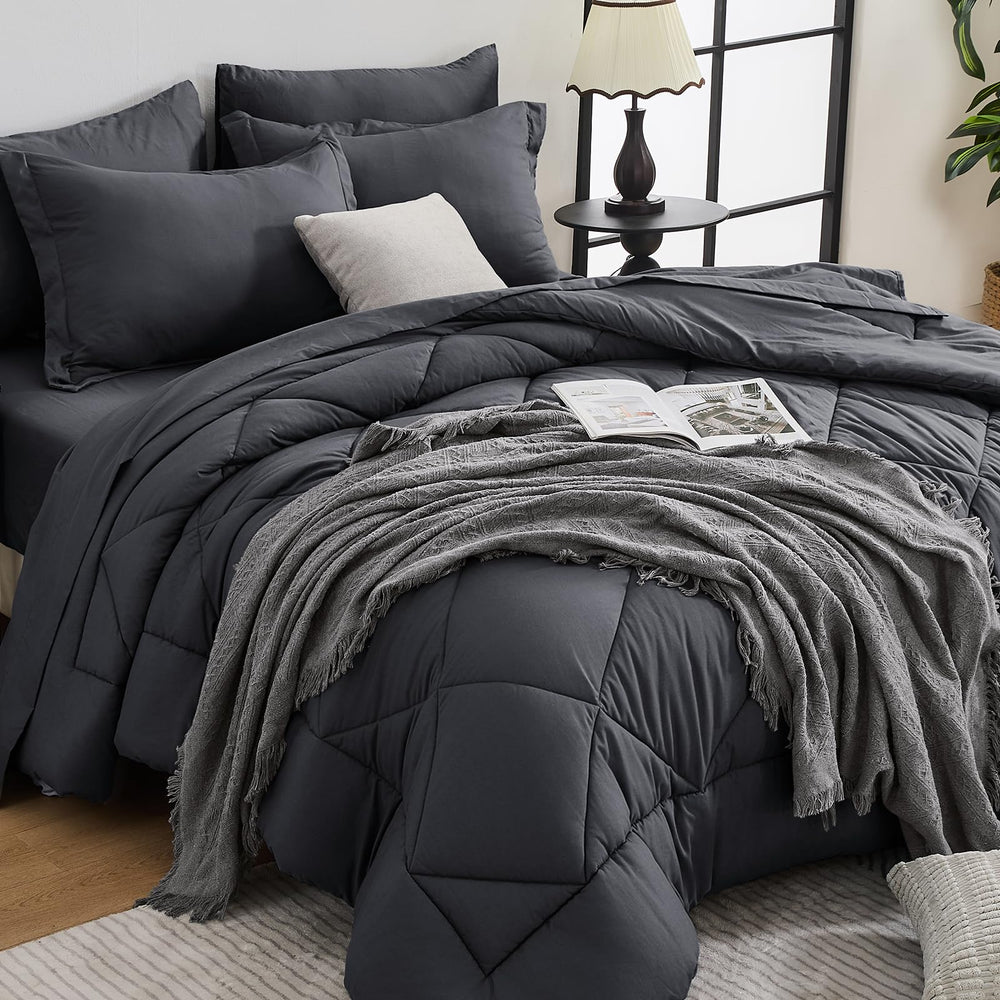 HEVUMYI front view of dark grey comforter showing neat finish and cozy appeal