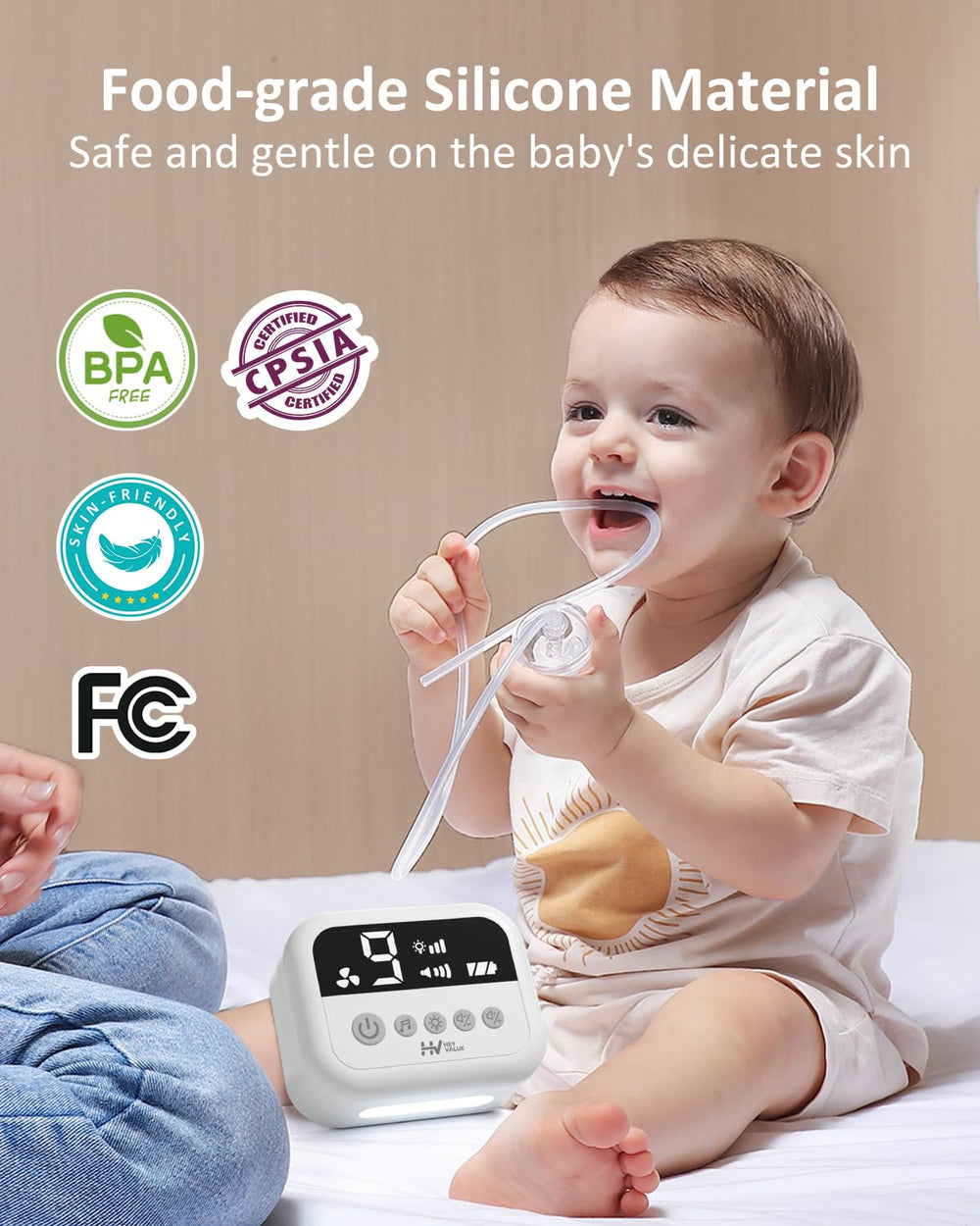 HEYVALUE aspirator next to a diaper bag showing portable size for on-the-go relief