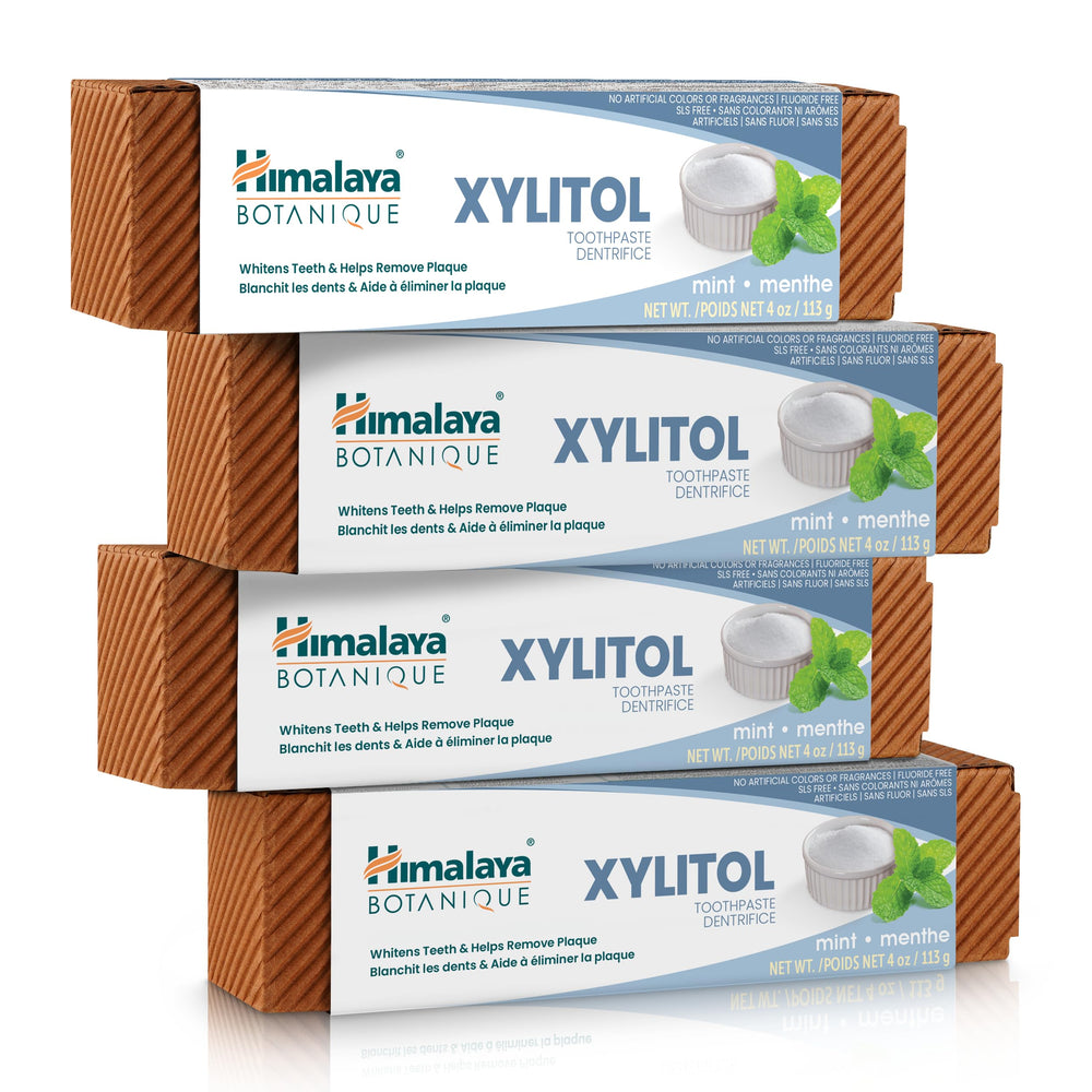 Himalaya front packaging showing four mint toothpaste tubes and benefits