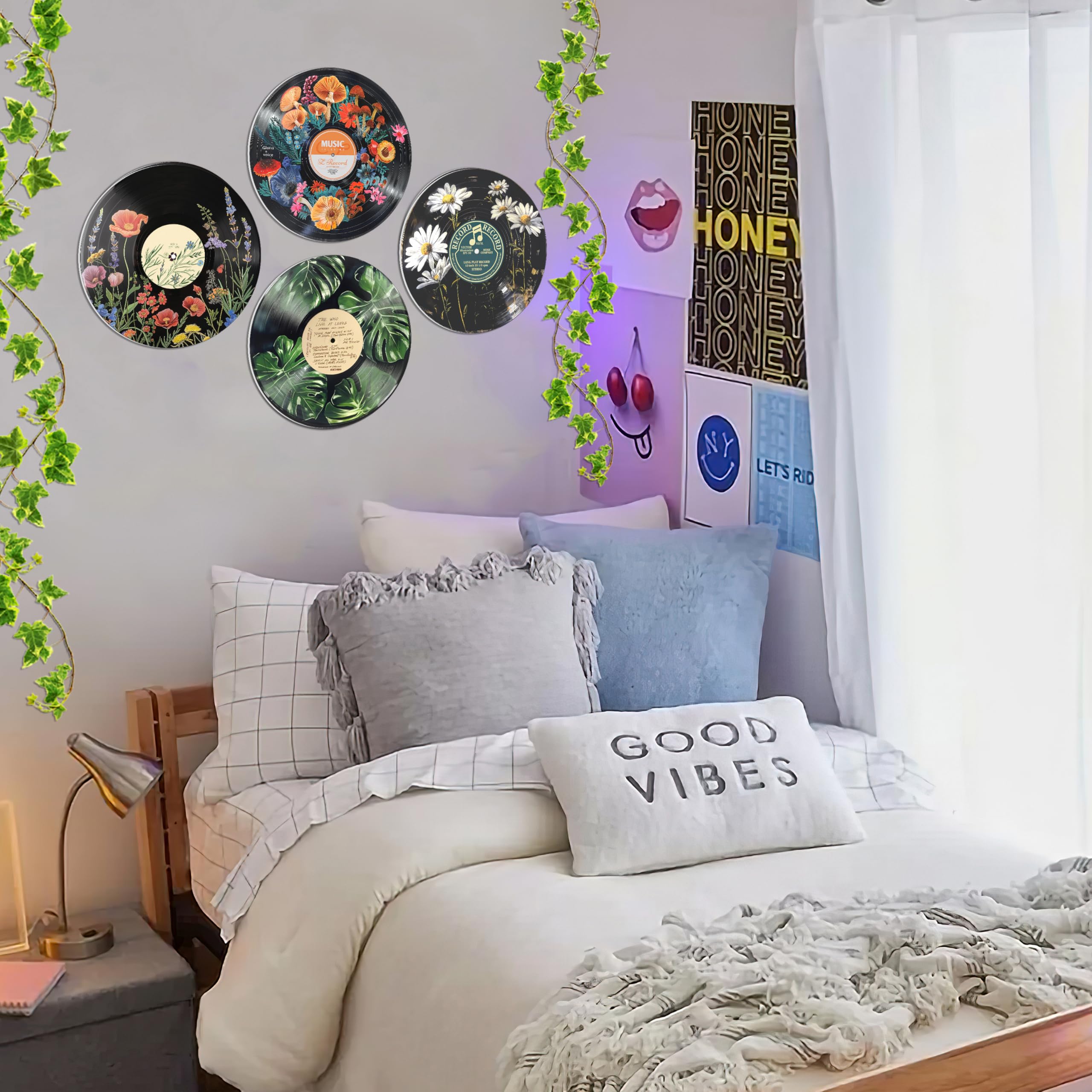 HK Studio posters beside vinyl records showing music room styling benefit
