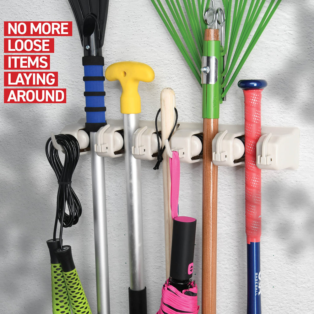 HOME IT next to standard broom illustrating compact size and capacity