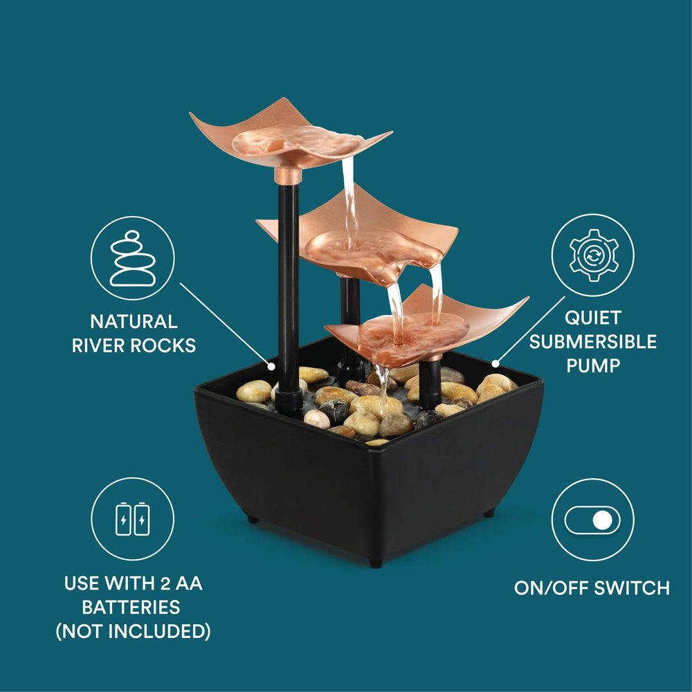 Homedics fountain lit at night providing soft ambient glow and relaxation