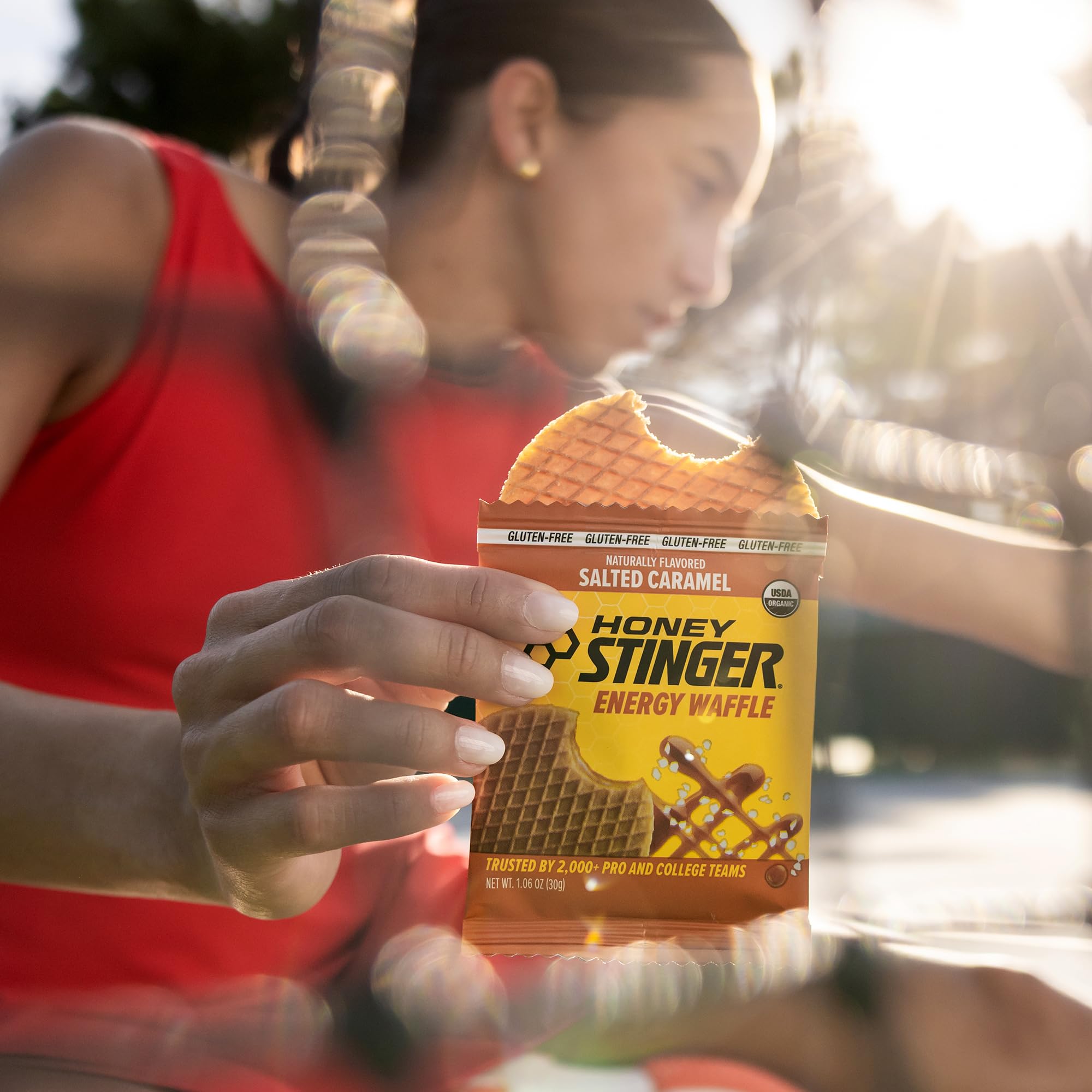 Gym bag with Honey Stinger box visible, lifestyle shot showing pre- and post-workout convenience