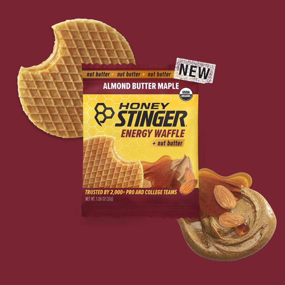 Honey Stinger single wrapped waffle in hand for portable fuel benefit