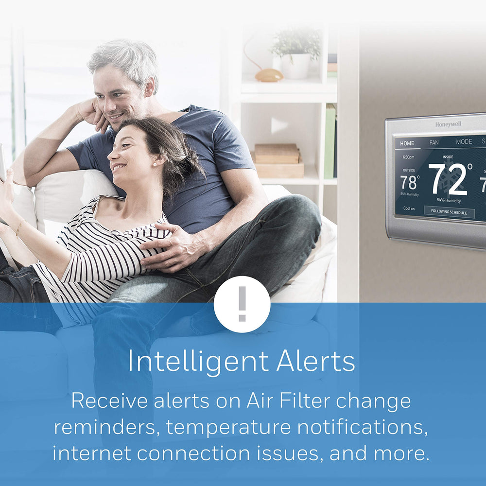 Honeywell Home thermostat installed in a living room demonstrating remote control benefits