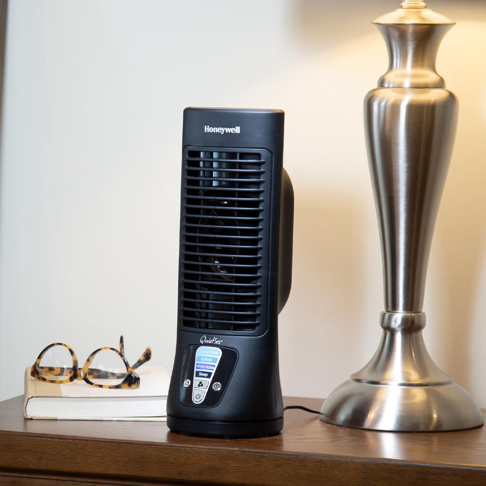 Honeywell HTF210B next to a notebook showing scale and portability benefit