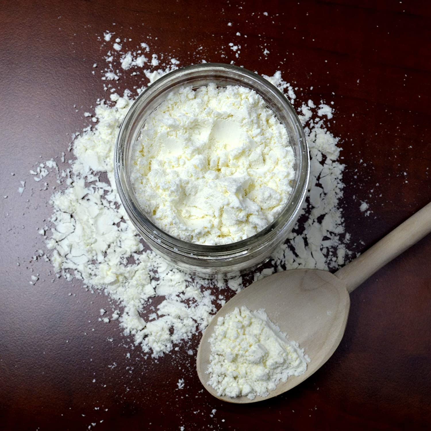 Hoosier Hill Farm powder sprinkled on popcorn delivering buttery snack seasoning